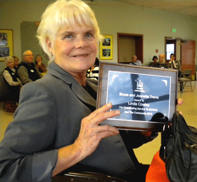 Linda Cooley with Award